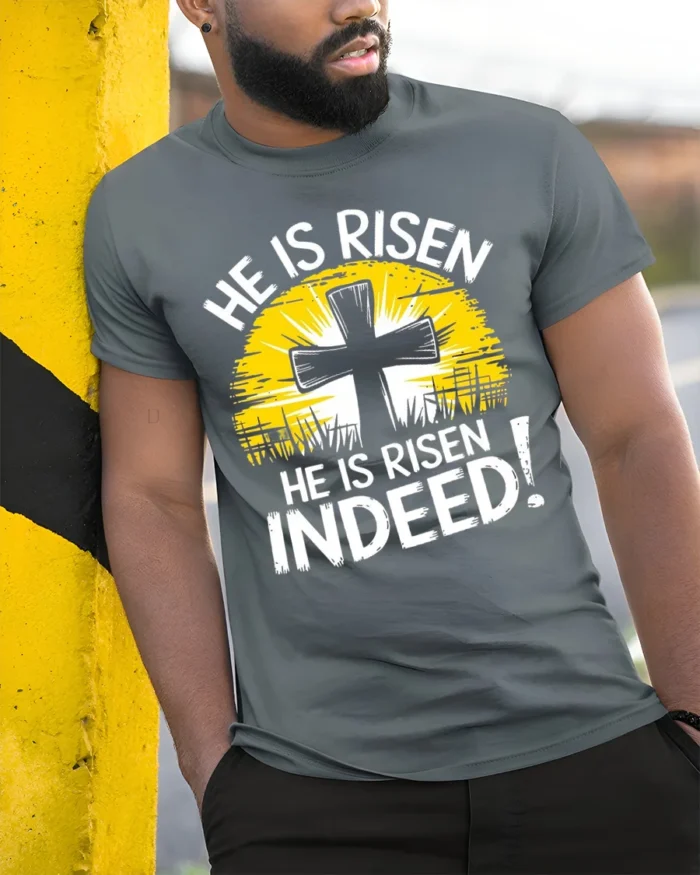He Is Risen Indeed Christian T-Shirt Easter Faith - model in grey shirt leaning against column