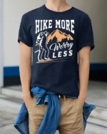 Hike More Worry Less T-Shirt Comfortable Hiking - model wearing navy shirt, hands in pockets