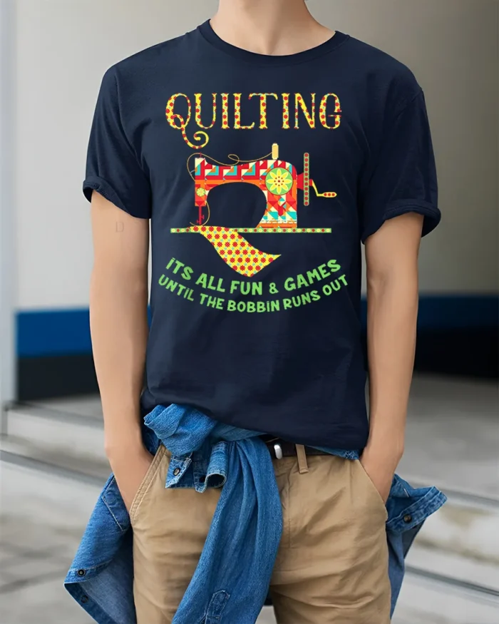 Quilting Fun T-Shirt Funny Bobbin Sewing Machine - model wearing navy shirt, hands in pockets