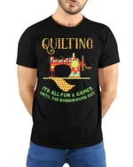 Quilting Fun T-Shirt Funny Bobbin Sewing Machine - model wearing black shirt, hands behind back