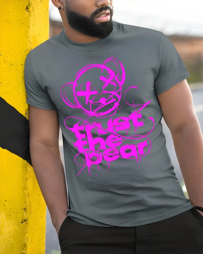Trust the Bear Graphic T-Shirt Bold Neon Pink Streetwear - model in grey shirt leaning against column
