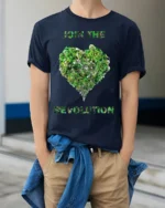 Join the Revolution T-Shirt Eco Biking Green Heart - model wearing navy shirt, hands in pockets