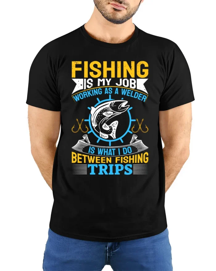 Fishing Is My Job T-Shirt Welder Between Fishing Trips - model wearing black shirt, hands behind back