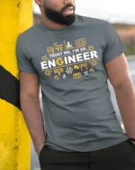 Trust Me I’m an Engineer T-Shirt Funny STEM Graphic - model in grey shirt leaning against column