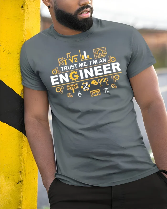 Trust Me I’m an Engineer T-Shirt Funny STEM Graphic - model in grey shirt leaning against column