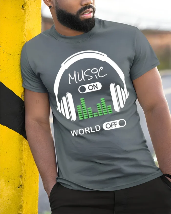 Music On World Off T-Shirt Headphones Audio Graphic - model in grey shirt leaning against column