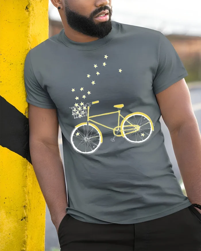 Starry Bicycle Ride T-Shirt Dreamy Bike Graphic - model in grey shirt leaning against column