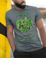 Join the Revolution T-Shirt Eco Biking Green Heart - model in grey shirt leaning against column