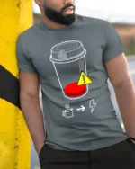Low Battery Coffee T-Shirt Caffeine Power Graphic - model in grey shirt leaning against column