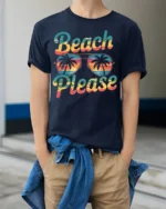 Beach Please Funny Sunset Graphic T-Shirt for Vacation - model wearing navy shirt, hands in pockets