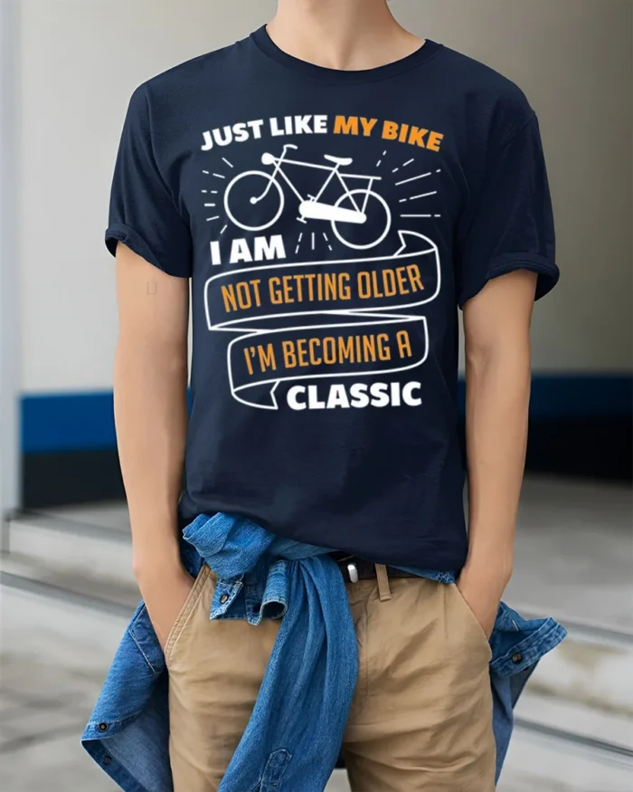 Funny Bike T-Shirt Not Getting Older I’m Classic Tee - model wearing navy shirt, hands in pockets