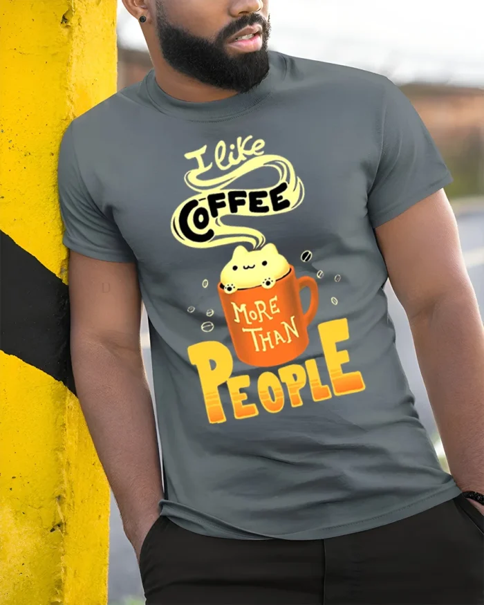 I Like Coffee More Than People Funny T-Shirt for Adults - model in grey shirt leaning against column
