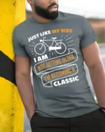 Funny Bike T-Shirt Not Getting Older Iām Classic Tee - model in grey shirt leaning against column