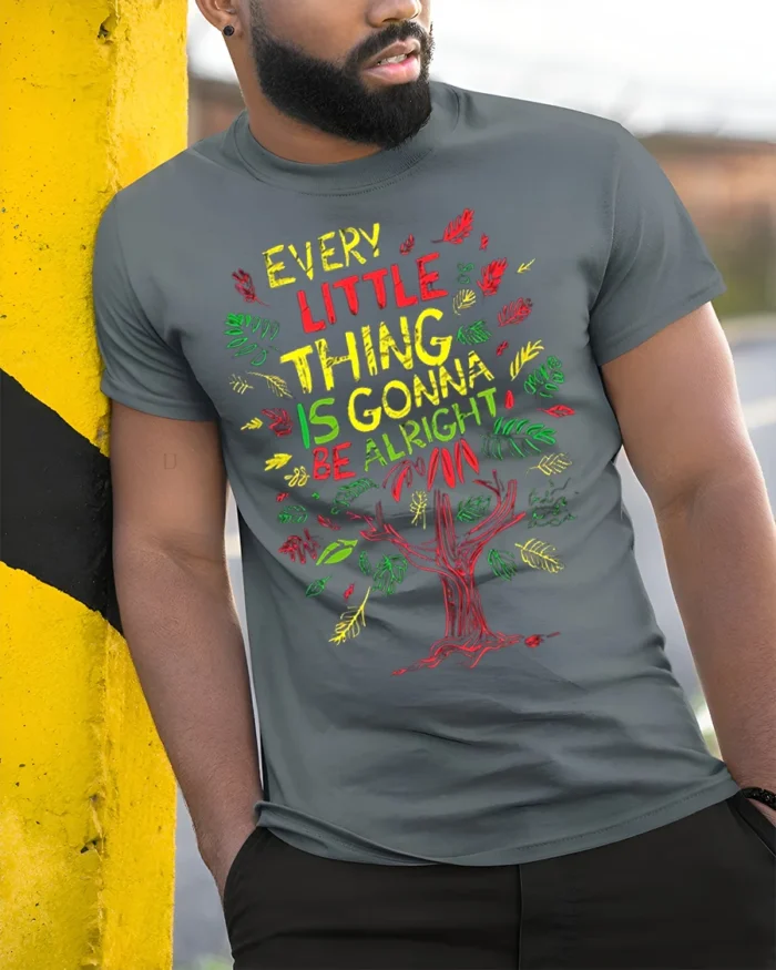 Every Little Thing Gonna Be Alright T-Shirt Reggae Tee - model in grey shirt leaning against column