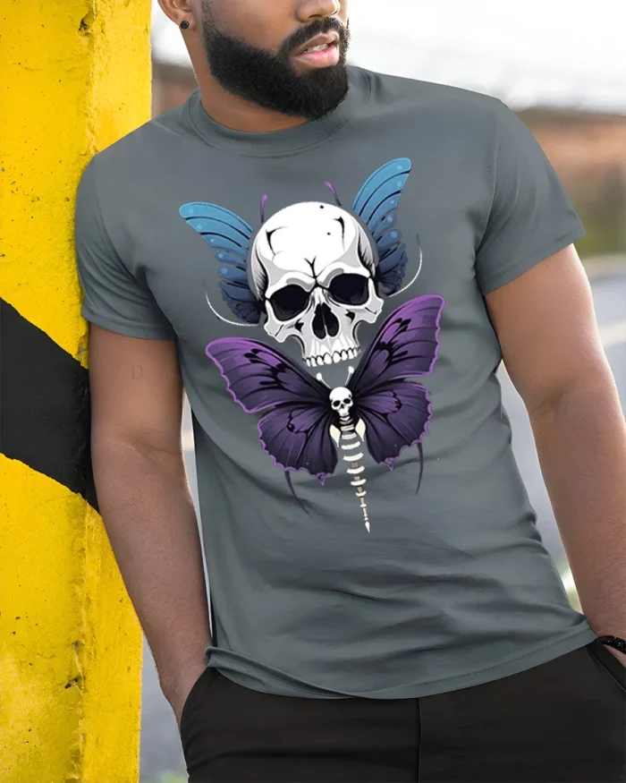 Skull Butterfly Gothic T-Shirt Dark Art Graphic Tee - model in grey shirt leaning against column