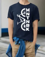 MTNBK Mountain Bike T-Shirt Bold MTB Graphic Tee - model wearing navy shirt, hands in pockets