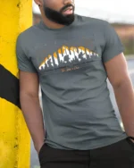 Amazing Outdoors Hiking T-Shirt Soft Cotton Trail Tee - model in grey shirt leaning against column