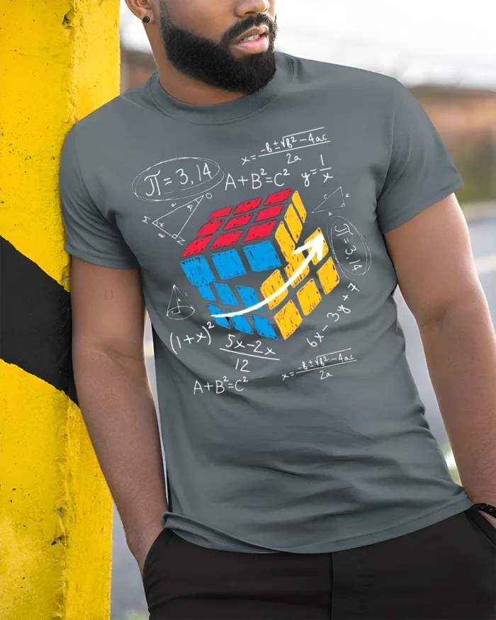 Math Puzzle Cube T-Shirt Nerdy Graphic Tee for Thinkers - model in grey shirt leaning against column