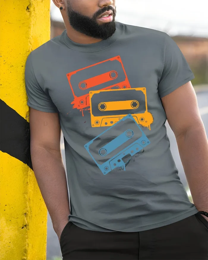 Retro Cassette Tape T-Shirt Vintage 80s Music Tee - model in grey shirt leaning against column