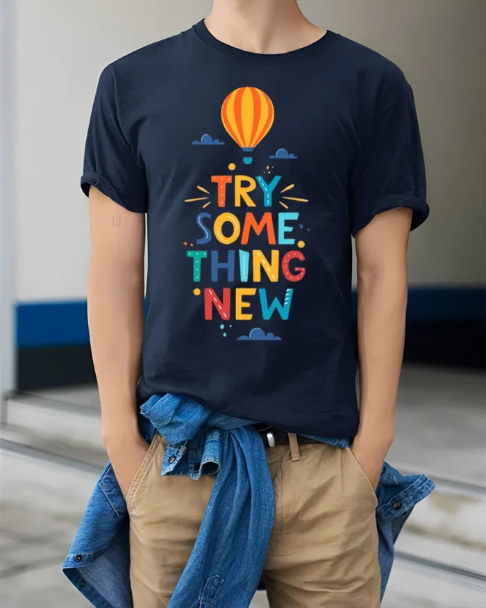 Try Something New T-Shirt Motivational Hot Air Balloon - model wearing navy shirt, hands in pockets