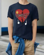 Broken Heart Music T-Shirt with Earphones and Notes - model wearing navy shirt, hands in pockets