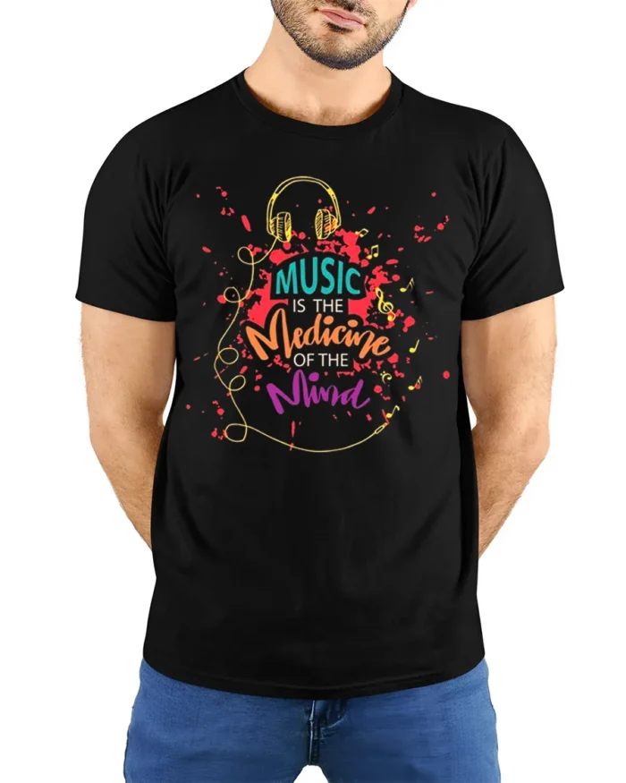 Music Is the Medicine of the Mind T-Shirt Soft Cotton - model wearing black shirt, hands behind back