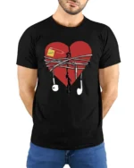 Broken Heart Music T-Shirt with Earphones and Notes - model wearing black shirt, hands behind back