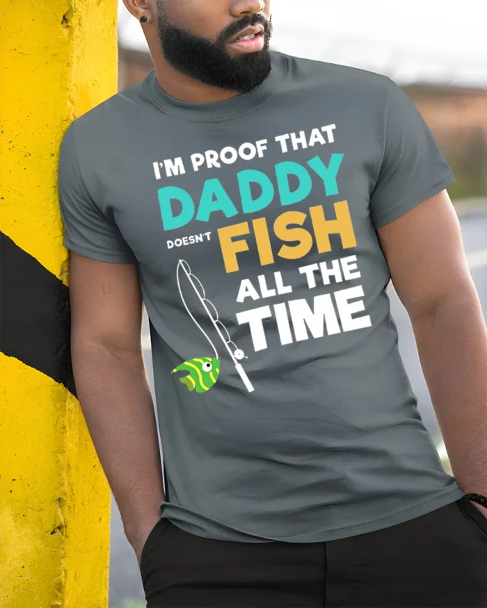 Daddy Doesn’t Fish All The Time T-Shirt Funny Gift - model in grey shirt leaning against column
