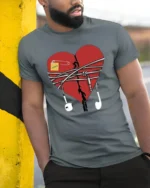 Broken Heart Music T-Shirt with Earphones and Notes - model in grey shirt leaning against column