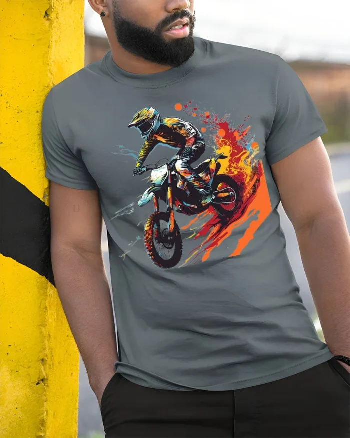 Extreme Dirt Bike Rider T-Shirt with Fire Trail Design - model in grey shirt leaning against column