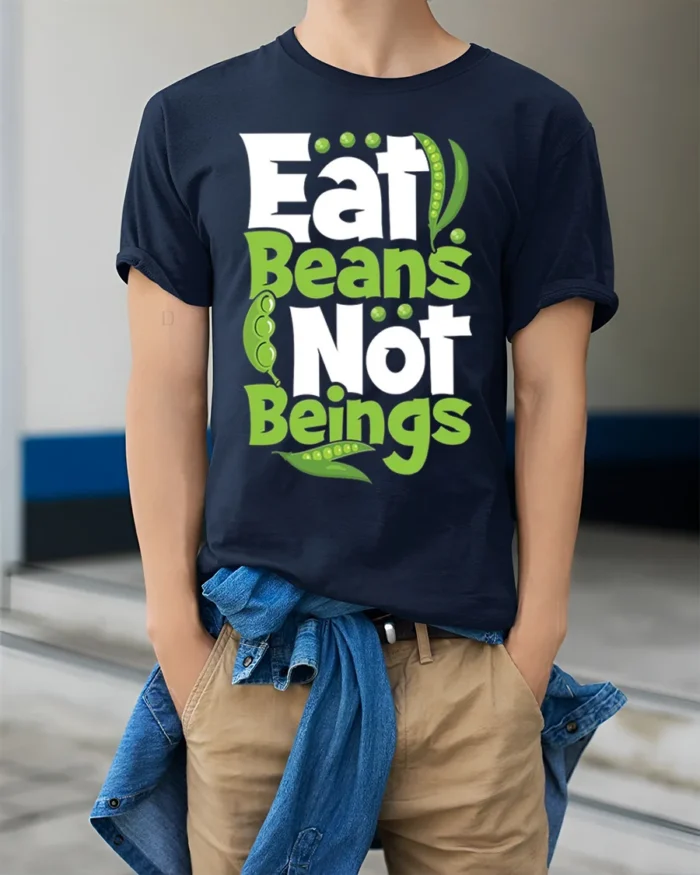 Eat Beans Not Beings Vegan T-shirt for Plant-Based Lovers - model wearing navy shirt, hands in pockets