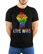 Love Wins Rainbow Pride Fist T-Shirt LGBTQ Equality - model wearing black shirt, hands behind back