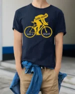 Smile More Ride a Bicycle Motivational Cycling T-Shirt - model wearing navy shirt, hands in pockets