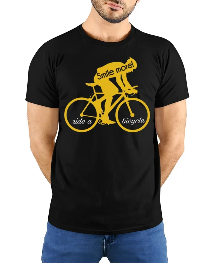 Smile More Ride a Bicycle Motivational Cycling T-Shirt - model wearing black shirt, hands behind back