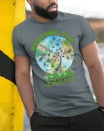 Restore The Earth T-Shirt Nature Graphic Eco Friendly - model in grey shirt leaning against column