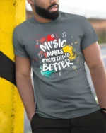 Music Makes Everything Better T-Shirt Retro Color Design - model in grey shirt leaning against column