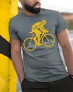 Smile More Ride a Bicycle Motivational Cycling T-Shirt - model in grey shirt leaning against column