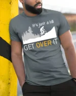 Funny Cycling T-Shirt It’s Just a Hill Get Over It Tee - model in grey shirt leaning against column