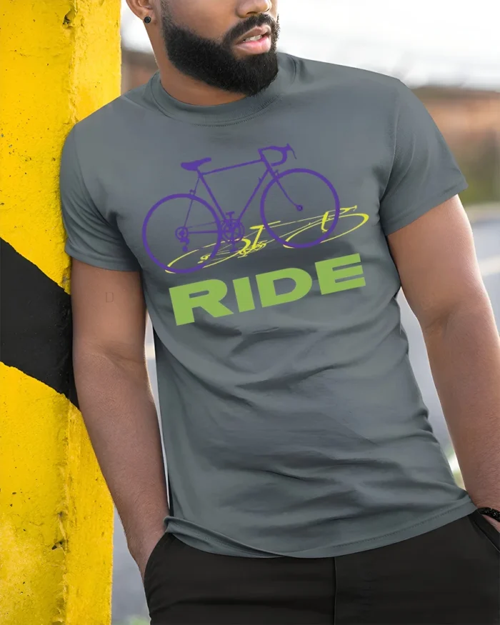Retro Bike RIDE Graphic T-Shirt for Cyclists and Riders - model in grey shirt leaning against column