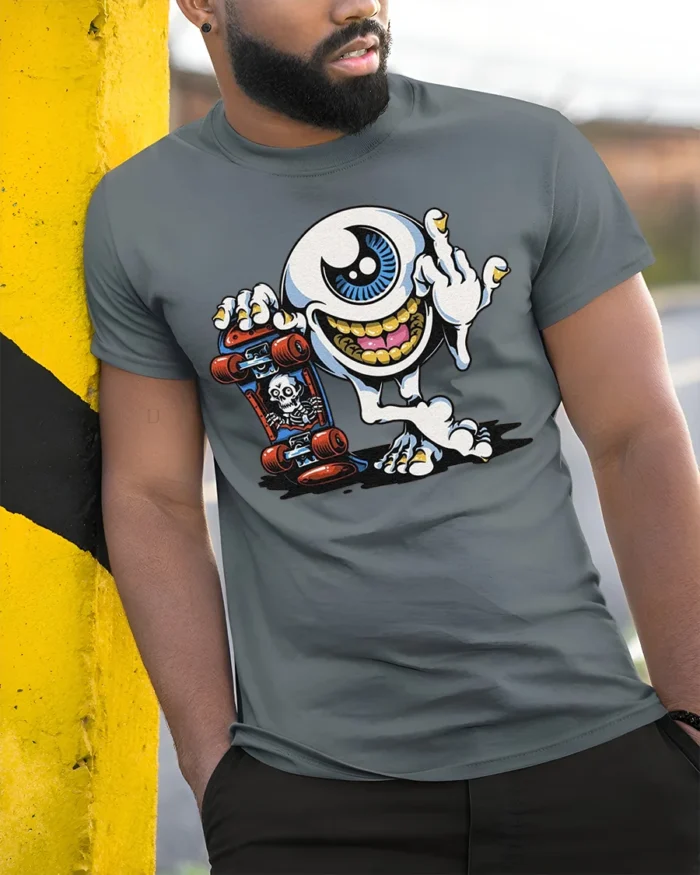 Skater Eyeball T-Shirt Edgy Punk Monster Graphic - model in grey shirt leaning against column