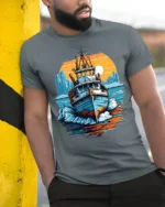 Sunset Boat Adventure T-Shirt Nautical Ocean Graphic - model in grey shirt leaning against column