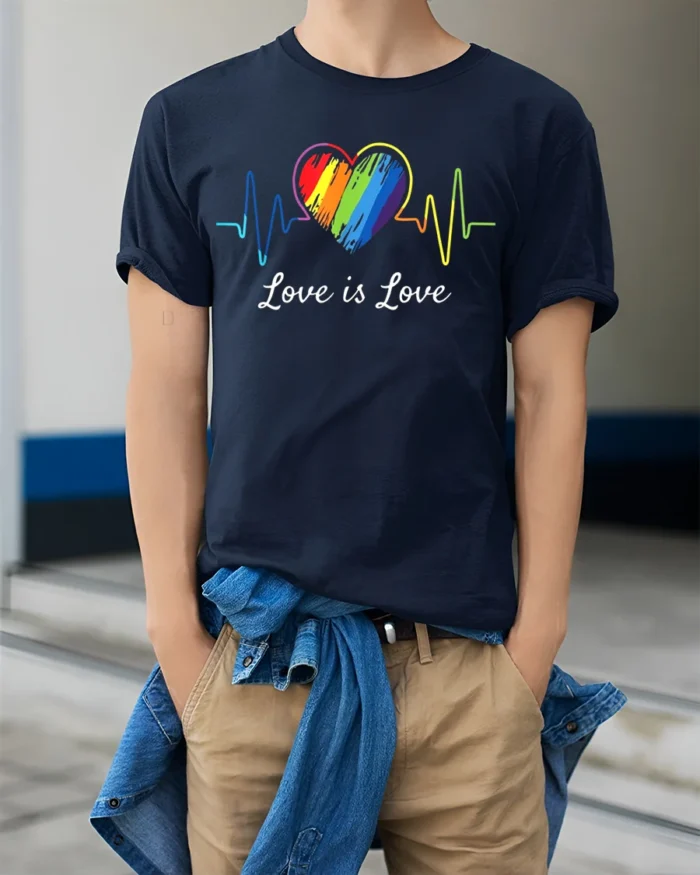 Love Is Love T-Shirt LGBTQ Rainbow Heart Pride - model wearing navy shirt, hands in pockets