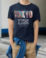 Tokyo Japan T-Shirt Neon City Skyline Graphic - model wearing navy shirt, hands in pockets