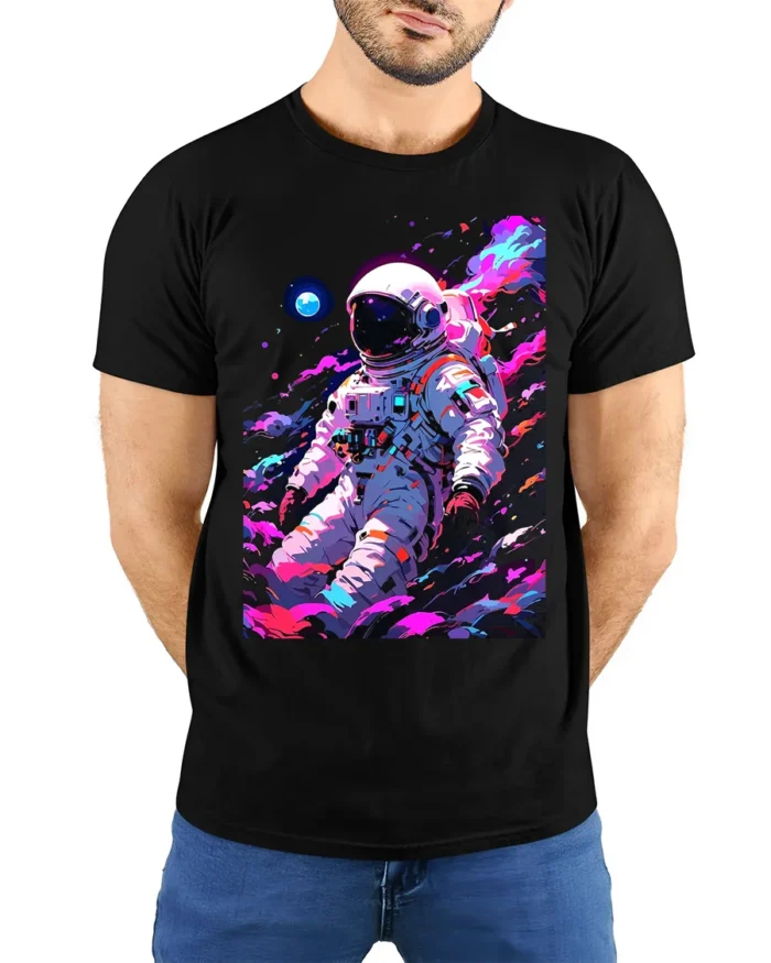 Astronaut Galaxy T-Shirt Neon Space Explorer Graphic - model wearing black shirt, hands behind back