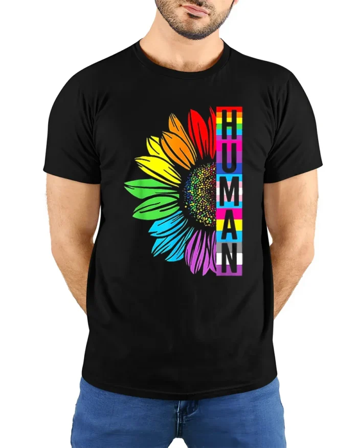 Human Pride T-Shirt Rainbow Sunflower LGBTQ+ Equality - model wearing black shirt, hands behind back