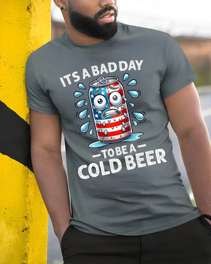 Funny Cold Beer T-Shirt It’s a Bad Day to Be a Can - model in grey shirt leaning against column