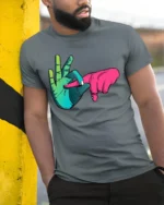 Colorful Hand Sign T-Shirt Cool Funky Graphic Streetwear - model in grey shirt leaning against column