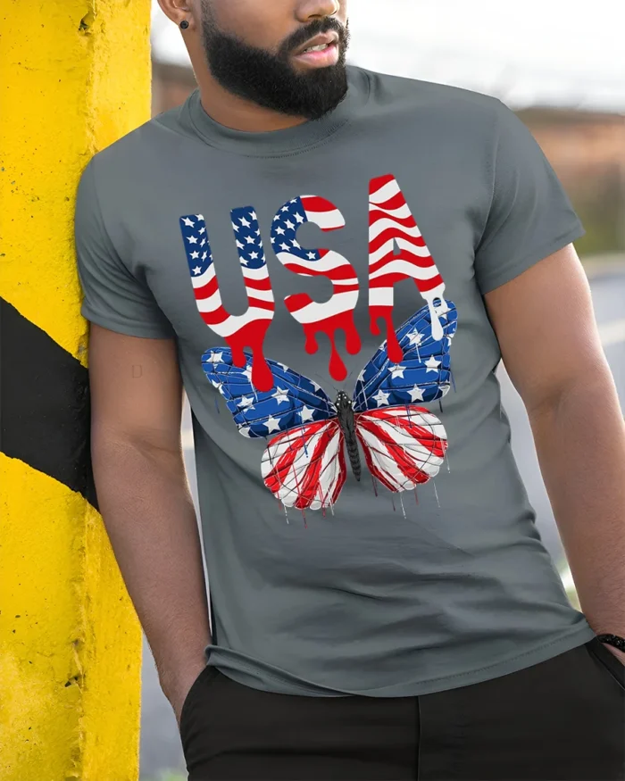 USA Flag Butterfly T-Shirt Patriotic Red White Blue - model in grey shirt leaning against column
