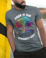 Pride Tree T-Shirt Strongest Root LGBTQ+ Unity - model in grey shirt leaning against column