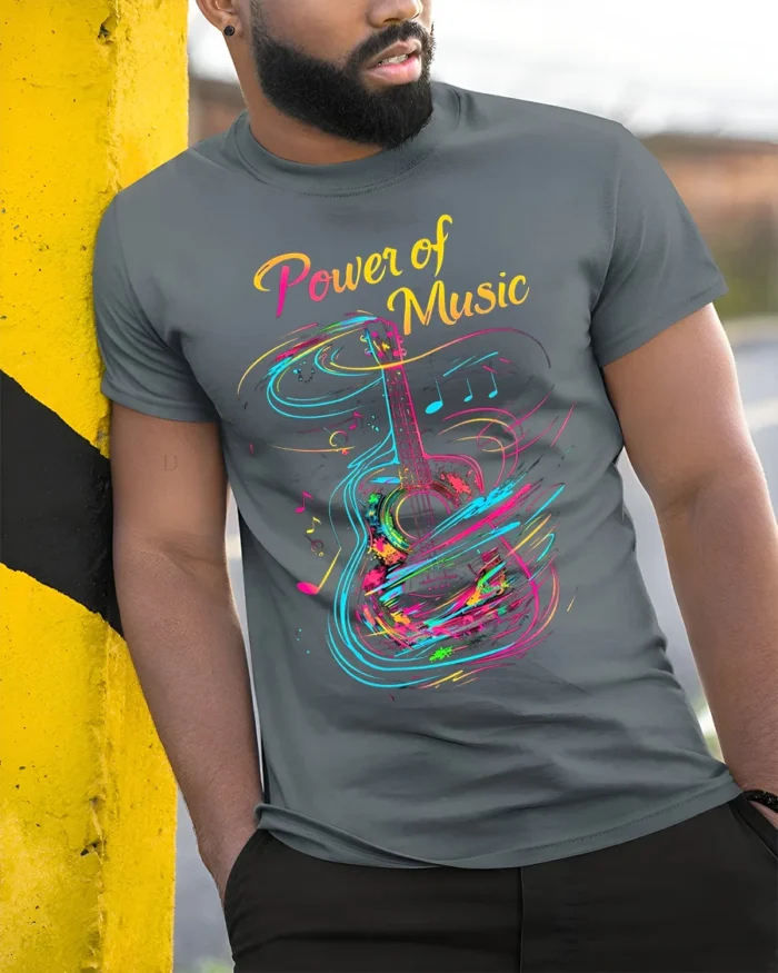 Colorful Guitar T-Shirt Power of Music Graphic - model in grey shirt leaning against column